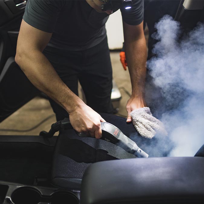 Interior steaming of a vehicle at the VEI shop